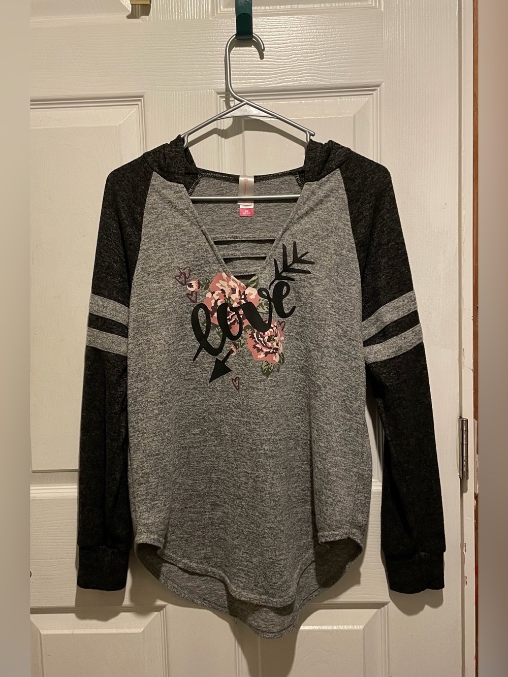 Juniors Love Pull Over Hoodie. Clean and has Never Been Worn. Size L(11-13). $6